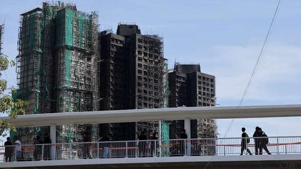 Число погибших при пожаре в ЖК в Гонконге возросло до 128